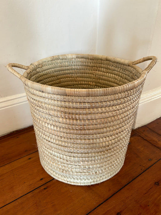 Woven basket with handles